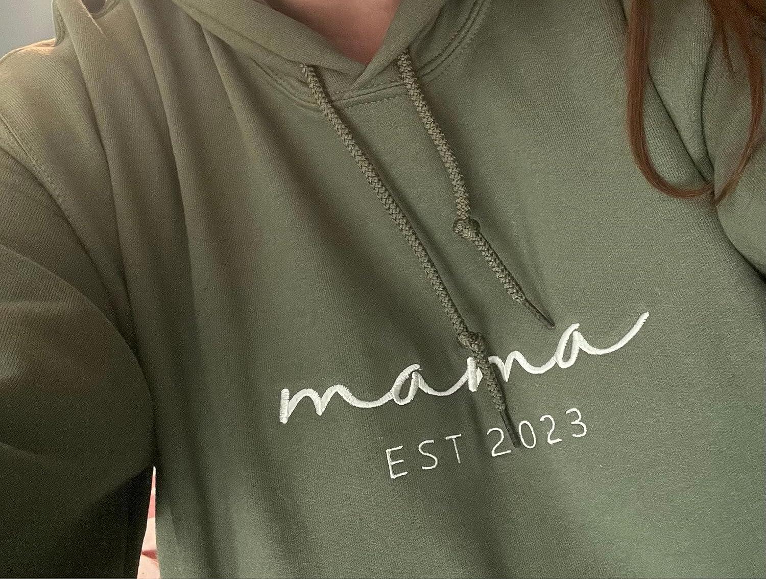 imageNAZENTI Mama Embroidered Fall Sweatshirt Mothers Day Sweatshirt Custom Mama Est Date Shirt with Kids Names on Sleeve Pregnancy Reveal Gift For New Mom Grandma Women Christmas Sweatshirt